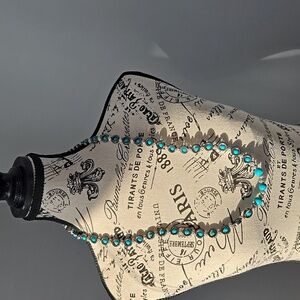 Hand-made hematite & wooden turquoise beaded necklace.  30 inches long.